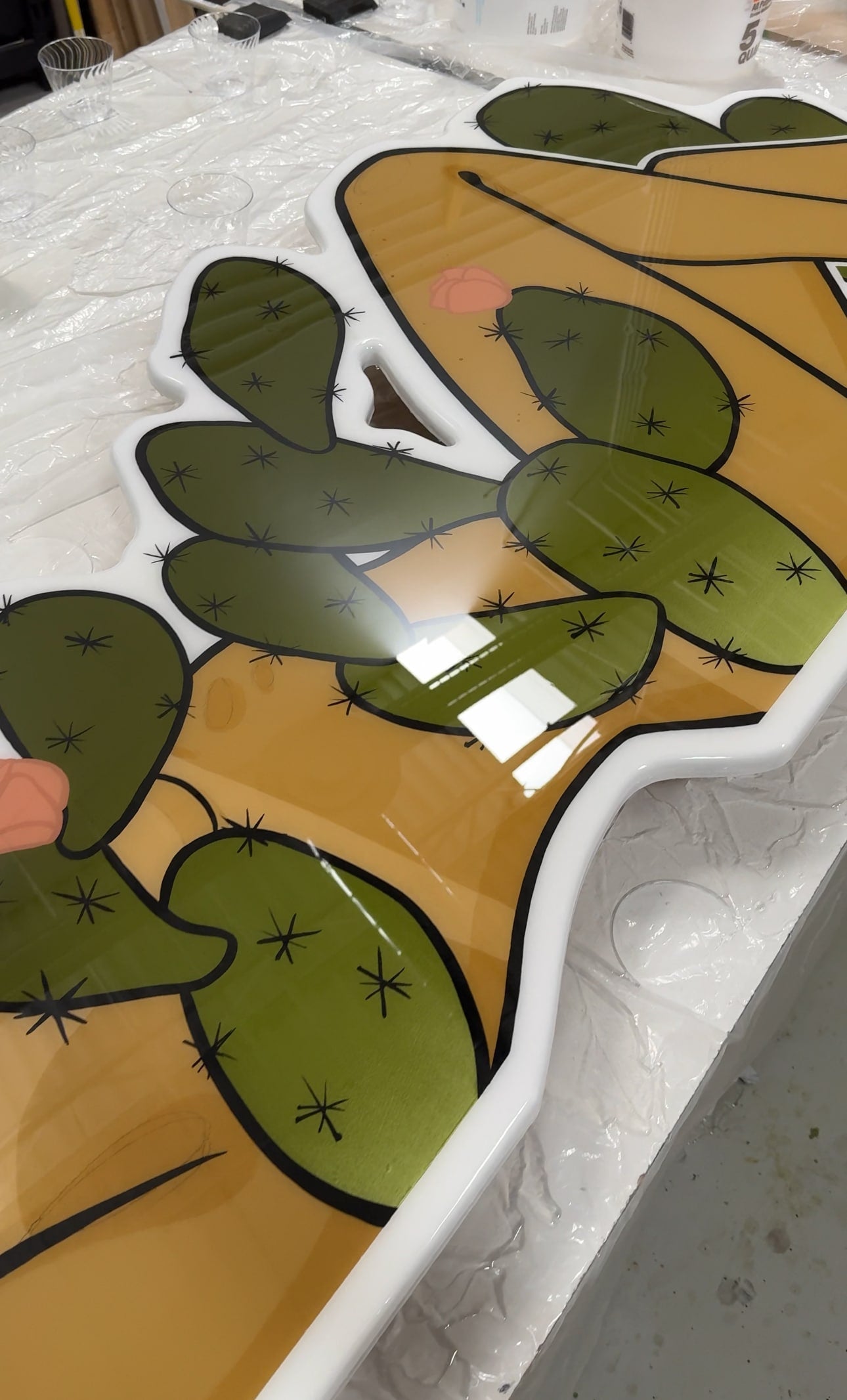 Artwork titled 'Prickly' featuring sharp lines and contrasting colors to depict a desert-inspired theme by St. Jame.